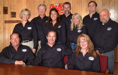 Front (L to R): T J Fisher, President, Dan Fisher, Vice President, Dorothy Lange, Controller, Rear (L to R): Diane Tone, Dick Tone, Lani Zang, Jeff Van Der Meersche, Chelly Fisher, Terry Oskerson, Pat Hodan